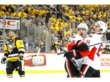 Jean-Gabriel Pageau of the Ottawa Senators celebrates his goal with teammate Mark Stone.