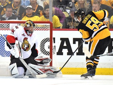 Jake Guentzel #59 of the Pittsburgh Penguins takes a shot on Craig Anderson #41 of the Ottawa Senators during the first period in Game Seven of the Eastern Conference Final during the 2017 NHL Stanley Cup Playoffs at PPG PAINTS Arena on May 25, 2017 in Pittsburgh, Pennsylvania.