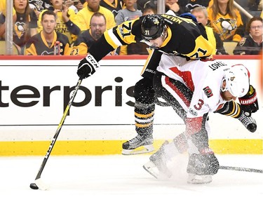 Evgeni Malkin #71 of the Pittsburgh Penguins collides with Marc Methot #3 of the Ottawa Senators during the second period in Game Seven of the Eastern Conference Final during the 2017 NHL Stanley Cup Playoffs at PPG PAINTS Arena on May 25, 2017 in Pittsburgh, Pennsylvania.