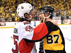 Erik Karlsson #65 of the Ottawa Senators congratulates Sidney Crosby #87 of the Pittsburgh Penguins after winning Game Seven of the Eastern Conference Final during the 2017 NHL Stanley Cup Playoffs at PPG PAINTS Arena on May 25, 2017 in Pittsburgh, Pennsylvania.