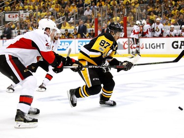 Sidney Crosby #87 of the Pittsburgh Penguins skates down the ice against Dion Phaneuf #2 of the Ottawa Senators during the first period in Game Two of the Eastern Conference Final during the 2017 NHL Stanley Cup Playoffs at PPG PAINTS Arena on May 15, 2017 in Pittsburgh, Pennsylvania.