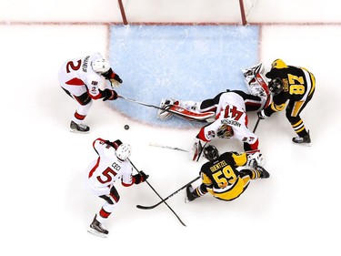 PITTSBURGH, PA - MAY 15:  Craig Anderson #41 of the Ottawa Senators makes a save against the Pittsburgh Penguins in Game Two of the Eastern Conference Final during the 2017 NHL Stanley Cup Playoffs at PPG PAINTS Arena on May 15, 2017 in Pittsburgh, Pennsylvania.