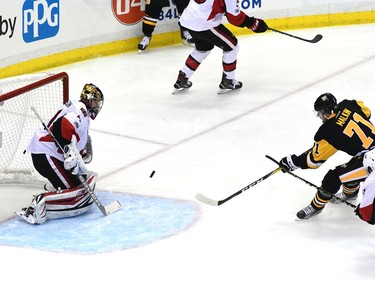 Craig Anderson #41 of the Ottawa Senators makes a save against Evgeni Malkin #71 of the Pittsburgh Penguins during the first period in Game Two of the Eastern Conference Final during the 2017 NHL Stanley Cup Playoffs at PPG PAINTS Arena on May 15, 2017 in Pittsburgh, Pennsylvania.