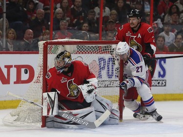 Ottawa Senators goalie Craig Anderson keeps his eyes on the puck.
