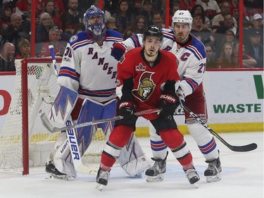 The Ottawa Senators' Jean-Gabriel Pageau parks himself in front of the Rangers' net.