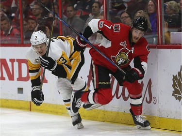 The Ottawa Senators taking on the Pittsburgh Penguins during game six of the eastern conference finals at the Canadian Tire Centre in Ottawa Tuesday May 23, 2017. Senators Kyle Turris goes into the boards with Olli Maatta  from the Penguins during first period action Tuesday night. Tony Caldwell