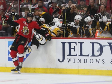 The Ottawa Senators taking on the Pittsburgh Penguins during game six of the eastern conference finals at the Canadian Tire Centre in Ottawa Tuesday May 23, 2017. Senators Derick Brassard takes Penguins Ian Cole over the boards  during first period action Tuesday night. Tony Caldwell