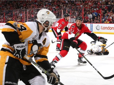 Fredrik Claesson defends Chris Kunitz of the Pittsburgh Penguins during the first period in Game Six of the Eastern Conference Final on May 23, 2017 in Ottawa.