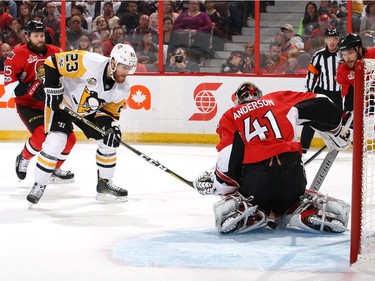 Scott Wilson #23 of the Pittsburgh Penguins takes a shot on Craig Anderson #41 of the Ottawa Senators during the first period in Game Six of the Eastern Conference Final during the 2017 NHL Stanley Cup Playoffs at Canadian Tire Centre on May 23, 2017 in Ottawa, Canada.