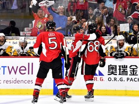 Mike Hoffman #68 of the Ottawa Senators celebrates with his teammate Clarke MacArthur #16 after scoring a goal on Matt Murray #30 of the Pittsburgh Penguins during the third period in Game Six of the Eastern Conference Final during the 2017 NHL Stanley Cup Playoffs at Canadian Tire Centre on May 23, 2017 in Ottawa, Canada.