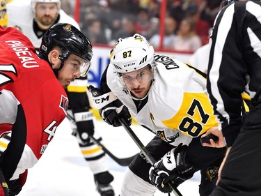 OTTAWA, ON - MAY 17:  Sidney Crosby #87 of the Pittsburgh Penguins faces off against Jean-Gabriel Pageau #44 of the Ottawa Senators during the first period in Game Three of the Eastern Conference Final during the 2017 NHL Stanley Cup Playoffs at Canadian Tire Centre on May 17, 2017 in Ottawa, Canada.