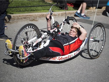 Ruth Hurst crossed the finish line on her hand cycle during the 5k race.