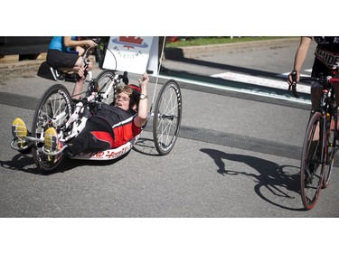 Ruth Hurst crossed the finish line on her hand cycle during the 5k race.