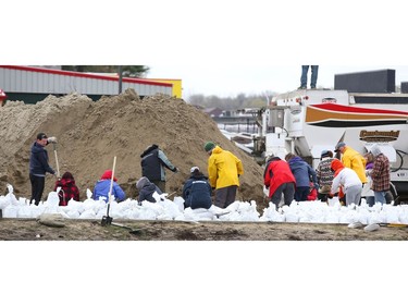 Sand bags are filled in Rockland to help stop the Ottawa river from flooding the Cumberland and Rockland area, May 08, 2017.