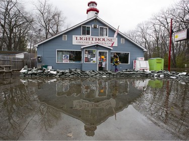 Sandy Yzh co-owner of the Lighthouse general store and restaurant surveys the water damage caused by flooding, in the community of Constance Bay about 40kms West of Ottawa on the Ottawa River, Tuesday May 9, 2017.