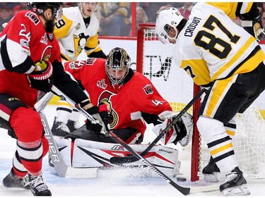 Sidney Crosby puts his own rebound past Craig Anderson in the second period of Game 4.