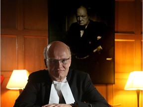 Files: Former speaker Geoff Regan sits in front of the original Karsh portrait of Winston Churchill in his office.