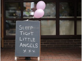A tribute stands outside a shop in the centre of the Lancashire village of Tarleton, the home village of Georgina Callander, 18, and Saffie Rose Roussos, 8, who were killed in the Manchester attack.