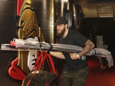 The Ottawa Senators' Fredrik Claesson leaves the dressing room after clearing out his locker.