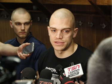 The Ottawa Senators' Mark Borowiecki speaks to reporters as the Sens clean out their lockers at the Canadian Tire Centre.
