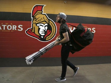 The Ottawa Senators' Mike Hoffman leaves the dressing room after clearing out his locker.