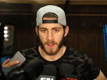 The Ottawa Senators' Mike Hoffman speaks to reporters as the Sens clean out their lockers at the Canadian Tire Centre.