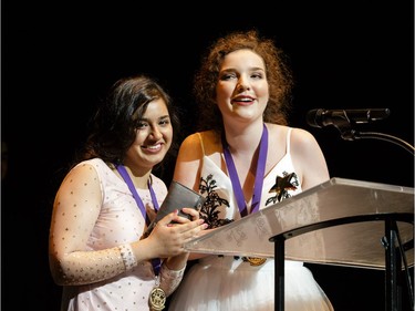The winners for Marketing and Publicity: Elmwood Theatre Marketing & Publicity Team, Elmwood School, Blue Stockings, Sophia Swettenham (R), and Jagnoor Saranaccept (L) accept their award, during the annual Cappies Gala awards, held at the National Arts Centre, on May 28, 2017, in Ottawa, Ont.