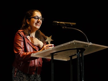 The winners for Props: Izza Choudhry, Christine Li (not shown), Allison Muse (not shown), and Emily Yang (not shown), Earl of March Secondary School, The Mystery of Edwin Drood, accept their award, during the annual Cappies Gala awards, held at the National Arts Centre, on May 28, 2017, in Ottawa, Ont.