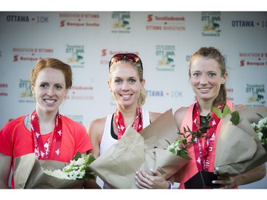 The top Canadian women in the 10K race were, from left, Victoria Coates (third place), Natasha Wodak (second place) and Rachel Cliff (first place).