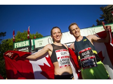 Top Canadian finishers Rachel Cliff and Eric Gillis at the finish line of the 10K race.