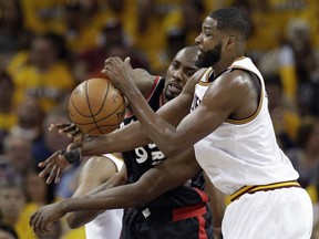 Toronto Raptors' Serge Ibaka, from Congo, and Cleveland Cavaliers' Tristan Thompson, right, battle for the ball in the first half in Game 1 of a second-round NBA basketball playoff series, Monday, May 1, 2017, in Cleveland. The Cavaliers won 116-105.