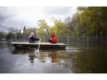 Water levels in Gatineau have started to come down in the flooding but major damage is starting to show Saturday May 13, 2017. Line Joanisse and Denis Strasbourg bought the boat so they can get to their home. They were seen paddling out on Rue Saint-Louis.