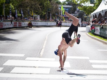 William Fortin did a cartwheel as he crossed the finish line of the marathon race part of the Tamarack Ottawa Race Weekend Sunday May 28, 2017. Fortin also did the same finish Saturday when he took part in the 10K race.