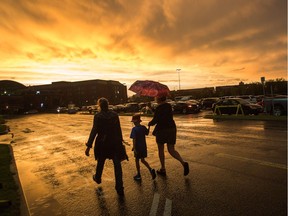 A strange looking orange sky following the thunderstorm. A number of people elected to leave the ballpark during the rain delay at the Ottawa Champions opening night of their CanAm season at RCGT Park Thursday.