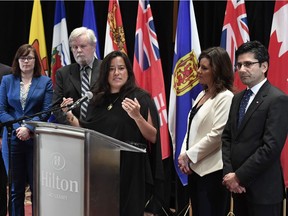 Minister of Justice and Attorney General of Canada Jody Wilson-Raybould, centre, speaks during a press conference as, from left, Nunavut Minister of Justice Keith Peterson, Alberta Minister of Justice and Solicitor General Kathleen Ganley, Northwest Territories Minister of Justice Louis Sebert, Quebec Minister of Justice and Attorney General Stephanie Vallee, and Ontario Attorney General Yasir Naqvi, look on, at the Federal-Provincial-Territorial Meeting of Ministers Responsible for Justice in Gatineau on Friday, April 28, 2017.