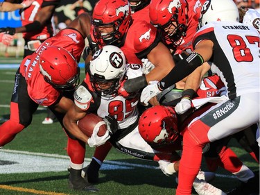 Postmedia Calgary

Ottawa Redblacks receiver Diontain Spencer is tackled during the first half of CFL action against the Calgary Stampeders at McMahon Stadium in Calgary on Thursday June 29, 2017. Gavin Young/Postmedia Network
Gavin Young, Gavin Young