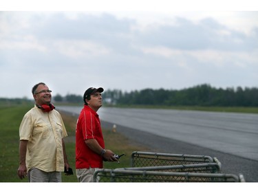 Pilots, spotters and spectators were at the Carp Airport to enjoy the miniature radio-controlled jet planes taking flight Saturday June 17, 2017. Blair Howkins was spotting for pilot Sandro Novelli who was flying a F14 Tomcat.   Ashley Fraser/Postmedia
Ashley Fraser, Postmedia