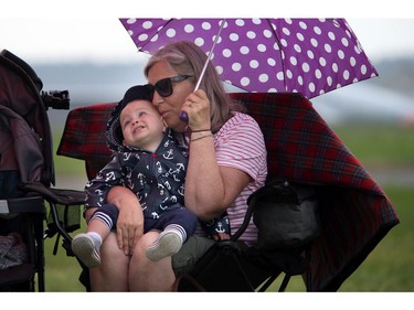 Pilots, spotters and spectators were at the Carp Airport to enjoy the miniature radio-controlled jet planes taking flight Saturday June 17, 2017. One-year-old Ty McIntyre was dressed for the rain as he watched the planes with his grandma Anne-Marie Alletson.   Ashley Fraser/Postmedia
Ashley Fraser, Postmedia