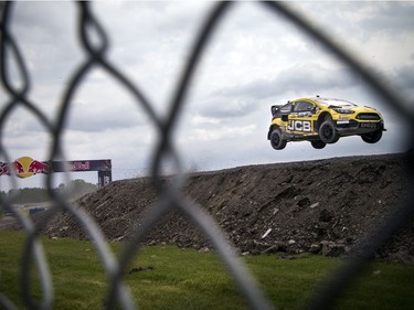 For the first time ever the Red Bull Global Rallycross made a Canadian stop over the weekend at the Canada Aviation and Space Museum. The only Canadian Steve Arpin of Fort Frances, Ontario flies through the air Sunday June 18, 2017.   Ashley Fraser/Postmedia
Ashley Fraser, Postmedia