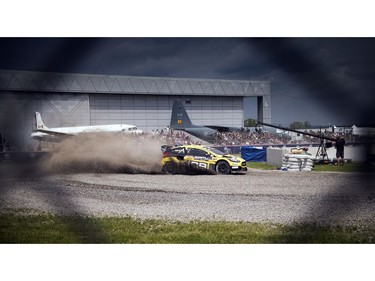 For the first time ever the Red Bull Global Rallycross made a Canadian stop over the weekend at the Canada Aviation and Space Museum. The only Canadian Steve Arpin of Fort Frances, Ontario whips around a tight bend sending rocks flying Sunday June 18, 2017.   Ashley Fraser/Postmedia
Ashley Fraser, Postmedia