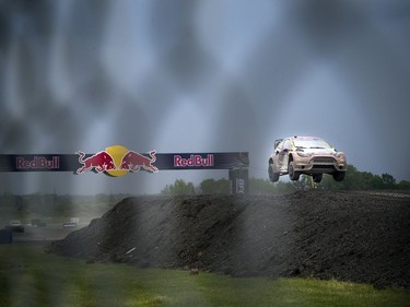 For the first time ever the Red Bull Global Rallycross made a Canadian stop over the weekend at the Canada Aviation and Space Museum. A racer flies over the jump Sunday June 18, 2017.   Ashley Fraser/Postmedia
Ashley Fraser, Postmedia