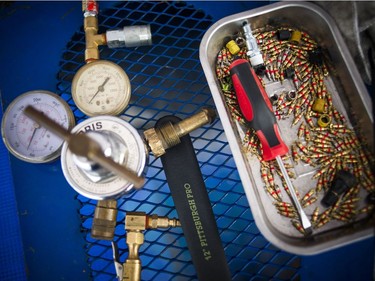 For the first time ever the Red Bull Global Rallycross made a Canadian stop over the weekend at the Canada Aviation and Space Museum. Valve cores lay in a tray along with other tools on the table in the BFGoodrich area Sunday June 18, 2017.   Ashley Fraser/Postmedia
Ashley Fraser, Postmedia