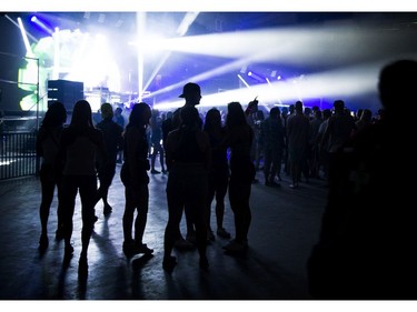 People danced to a DJ performing on the arena floor at TD Place.
