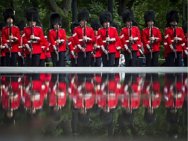 His Excellency the Right Honourable David Johnston, Governor General and Commander-in-Chief of Canada host  the annual Inspection of the Ceremonial Guard and the launch of Storytime on Sunday, June 25, 2017, at Rideau Hall. The Ceremonial Guard was reflected in the new Fountain of Hope in front of Rideau Hall Sunday.   Ashley Fraser/Postmedia
Ashley Fraser, Postmedia