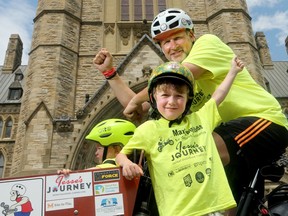 Max Sedmihradsky, six, along with his dad Andrew and little sister Isla, 18 mos., pulled onto Parliament Hill Monday (June 12, 2017) in their cargo bike after peddling from Hamilton to Ottawa for the third annual Max's Big Ride.