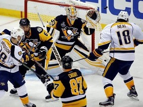 Pittsburgh Penguins goalie Matt Murray (30) turns away a Nashville Predators shot during the second period in Game 2 of the NHL hockey Stanley Cup Final, Wednesday, May 31, 2017, in Pittsburgh.