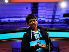 Nikhil Lahiri, 14, of Painted Post, N.Y., grimaces as he is told that he spelled a word incorrectly during the 90th Scripps National Spelling Bee in Oxon Hill, Md., Thursday, June 1, 2017. (AP Photo/Jacquelyn Martin)