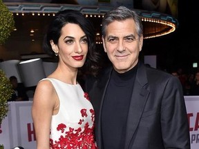 FILE - In this Feb. 1, 2016 file photo, Amal Clooney, left, and George Clooney arrive at the world premiere of &ampquot;Hail, Caesar!&ampquot; in Los Angeles. George and Amal Clooney have welcomed twins Ella and Alexander Clooney. The pair was born Tuesday morning, June 6, 2017, according to George Clooney‚Äôs publicist Stan Rosenfield. (Photo by Jordan Strauss/Invision/AP, File)