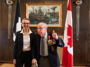 Royal Canadian Navy veteran, Fred Turnbull, 92, gives the thumbs up next to Laurence Monmayrant, Consul General of France for the Atlantic Provinces, after he received the French Legion of Honour during a ceremony at CFB Halifax in Halifax, Friday June 9, 2017. Amongst his military accomplishments, in the summer of 1942, the then 17 year old Turnbull served as a bowman/gunner onboard Canadian landing craft at Normandy. The Legion of Honour is France&#039;s highest decoration, over 600 Canadian vetera