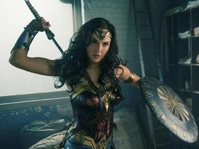 This image released by Warner Bros. Entertainment shows Gal Gadot in a scene from &ampquot;Wonder Woman.&ampquot; ‚ÄúWonder Woman‚Äù wrapped up Tom Cruise‚Äôs ‚ÄúThe Mummy‚Äù at the weekend box office, pulling in an estimated $57.2 million in North American theaters.